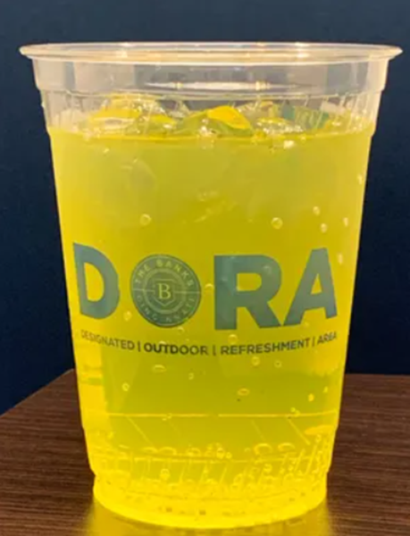 DORA cup with yellow beverage